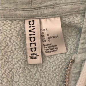 Divided by H&M gray and mint color zip up hoodie.